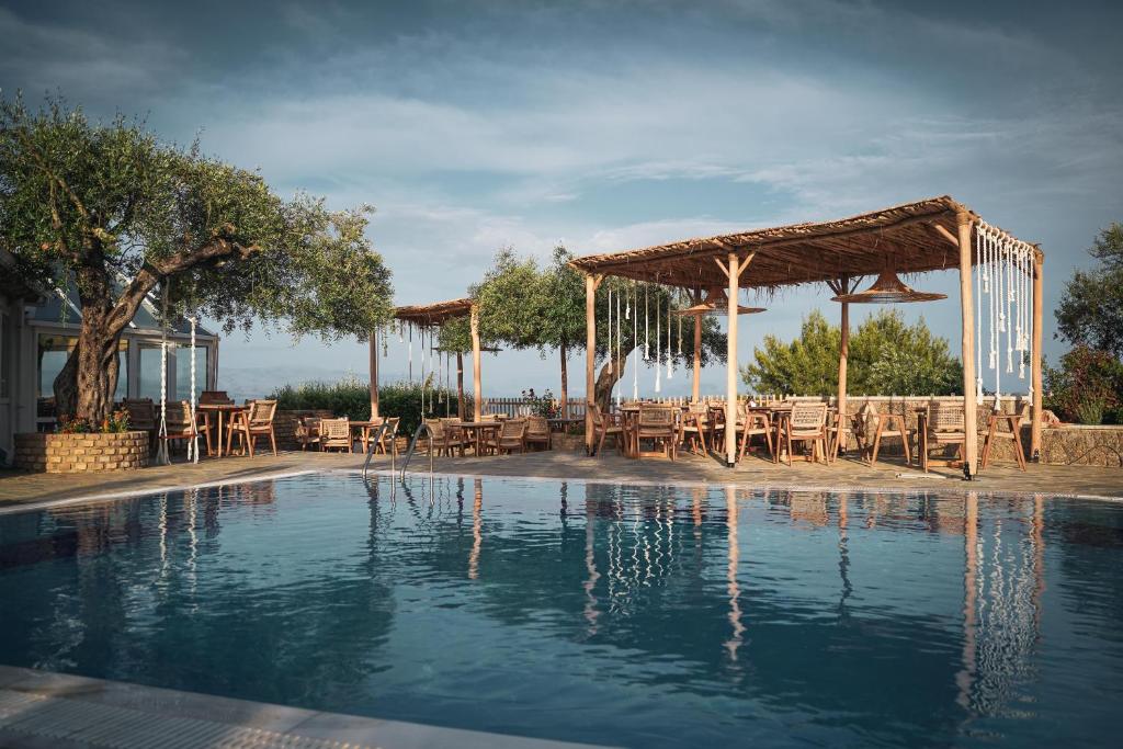 pool with calm waters and beds around it