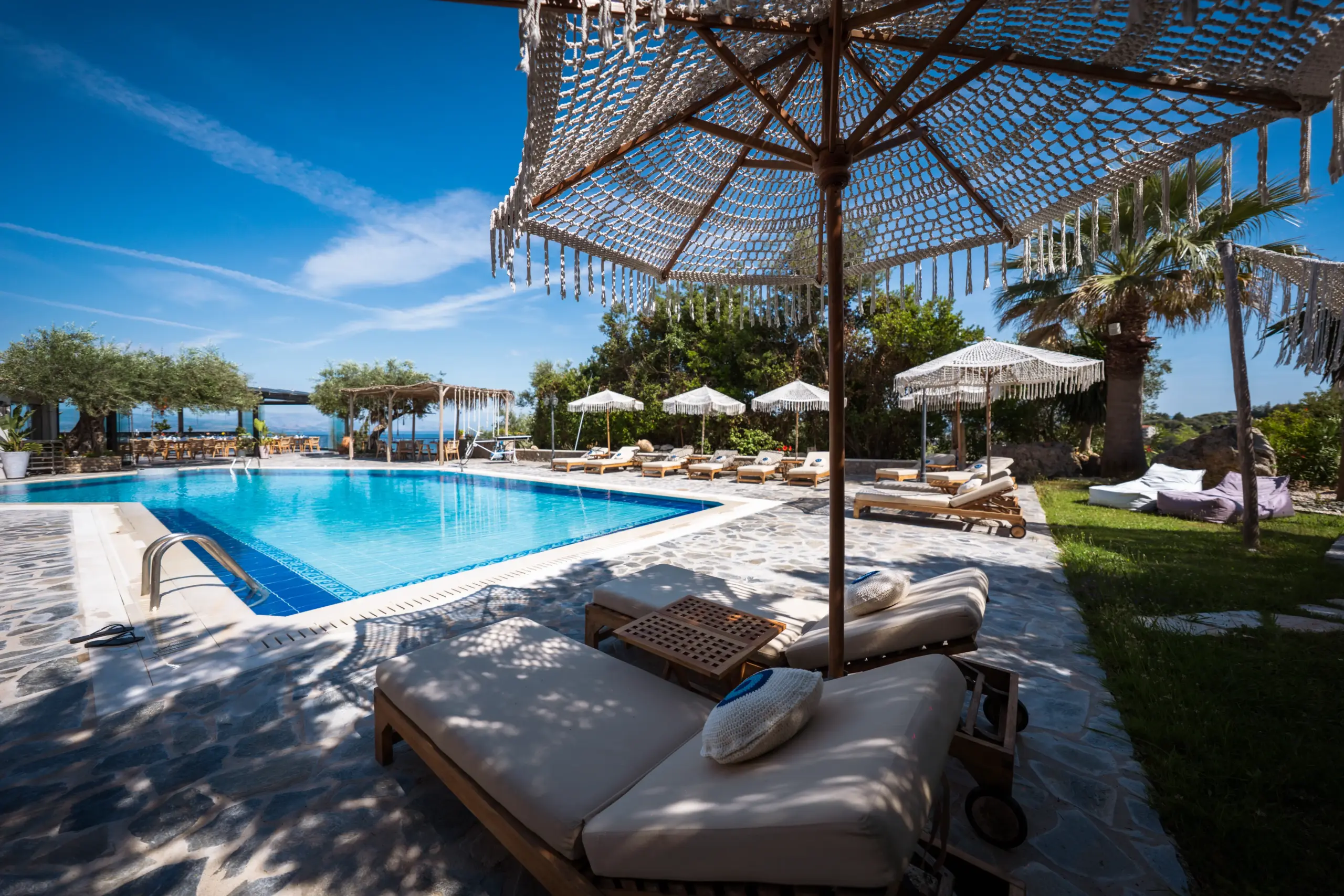 swimming pool with umbrellas